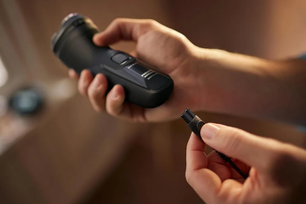 Philips Norelco Shaver 2400 Series Wet & Dry Electric Shaver with Pop-up Trimmer and Protective Cap, Deep Black (Model X3001/90)