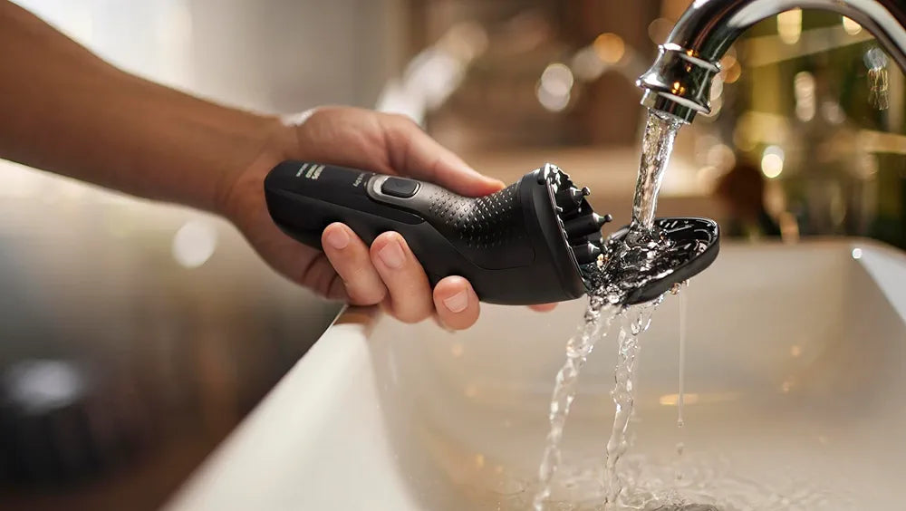 Philips Norelco Shaver 2400 Series Wet & Dry Electric Shaver with Pop-up Trimmer and Protective Cap, Deep Black (Model X3001/90)